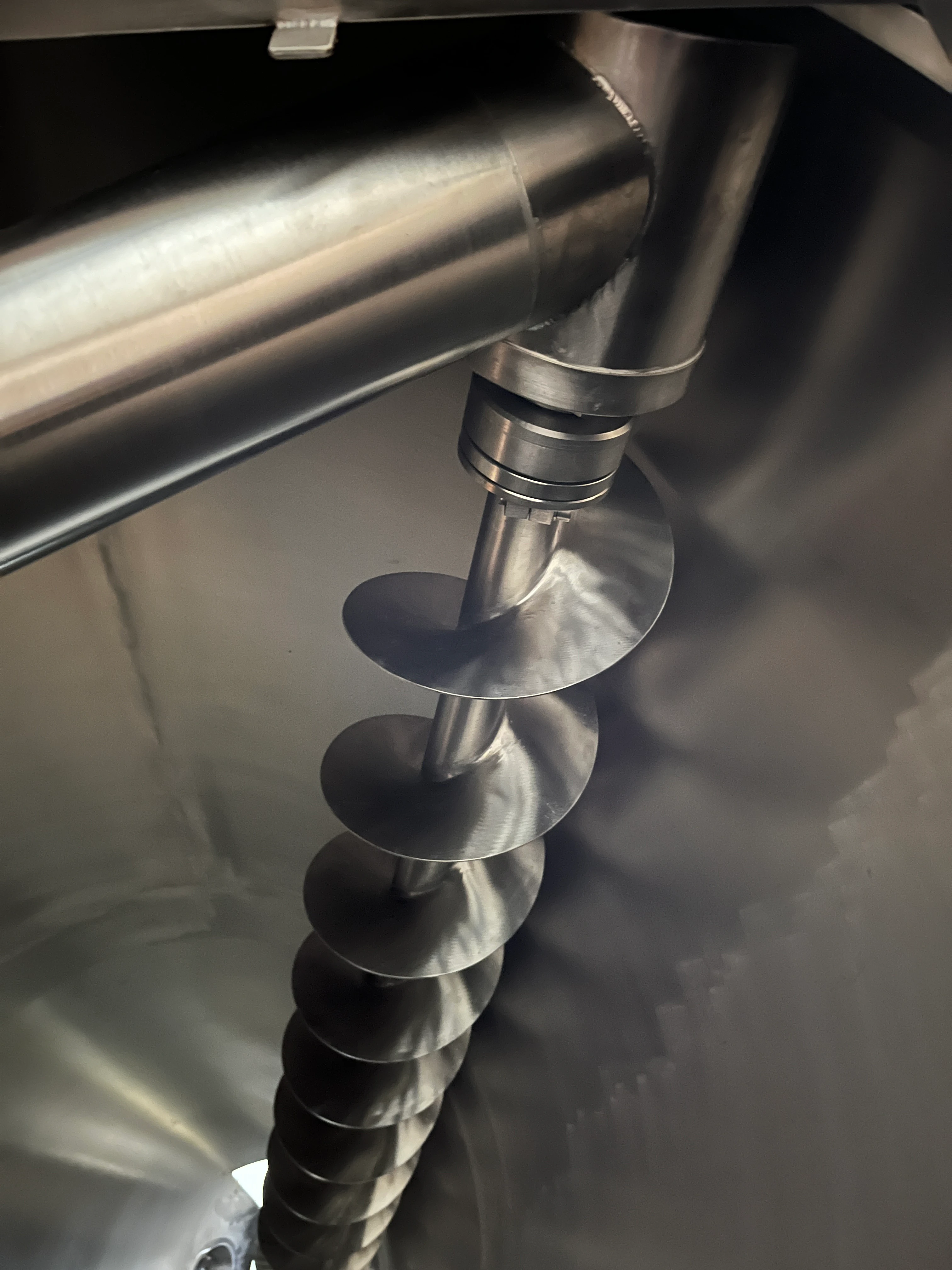 Conical screw mixer arm and agitator
